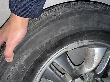 Шины и диски: Колесо в сборе для внедорожника/SUV. Состав: - Шина Bridgestone — 2