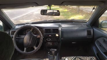 Транспорт: Nissan Almera: 1.6 л | 1996 г. | Хэтчбэк | Хорошее