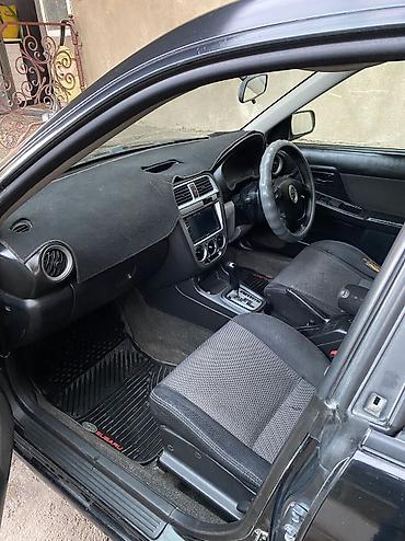 byd e9 1: Subaru Impreza: 2002 г., 2 л, Автомат, Хэтчбэк — 5