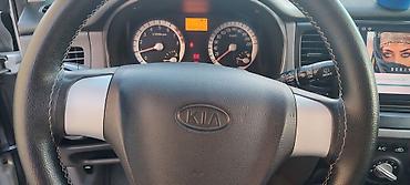 Kia: Kia Rio hatchback - Gümüş rəngli kuzov, 5 qapı - Mexaniki sürətlər — 7