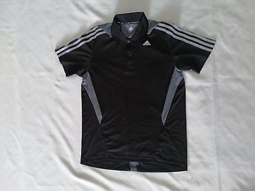 Original ADIDAS muška polo-majica. Polo-majica je u dobrom stanju na lalafo.rs Original ADIDAS muška polo-majica. Polo-majica je u dobrom stanju