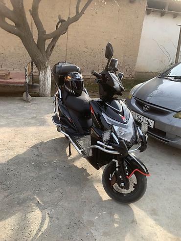 Скутеры: Скутер Skillmax, черный, с богатым комплектом освещения и туристским — 16