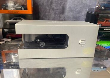 Avtomobil modelləri: Коллекционная модель Mercedes-Benz E Class W212 brown 2009 Dealer — 2