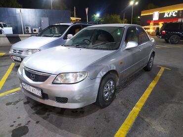 mazda седан: Mazda Familia: 2001 г., 1.3 л, Автомат, Бензин, Седан