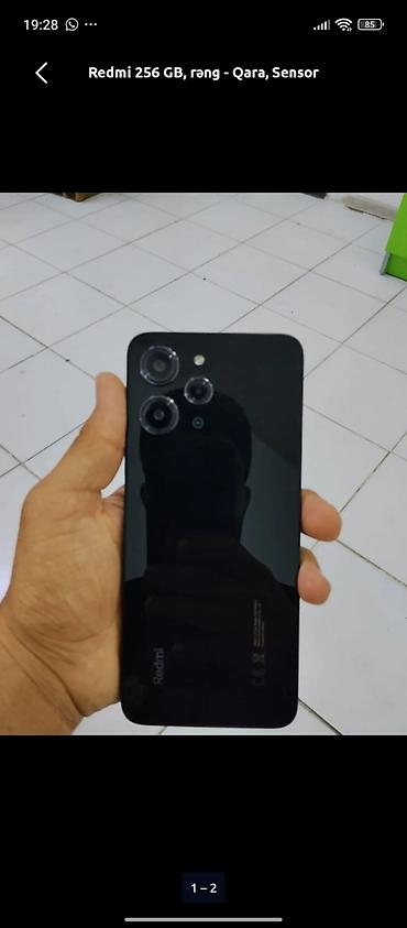 mobil tel: Redmi 12, 256 GB, rəng - Qara, Qırıq, Barmaq izi, Simsiz şarj — 2