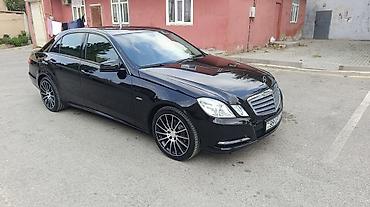 tesla model s: Mercedes-Benz E-Class: 2.2 l | 2011 il Sedan — 1