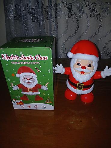 sekileri: Elektrikli Santa Claus – rəqs edən, musiqi və işıqlarla təzədir - — 1
