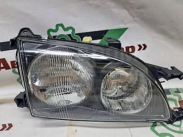 Toyota Avensis (кузов T220, 1997–2000 годы) или Toyota Caldina (кузов