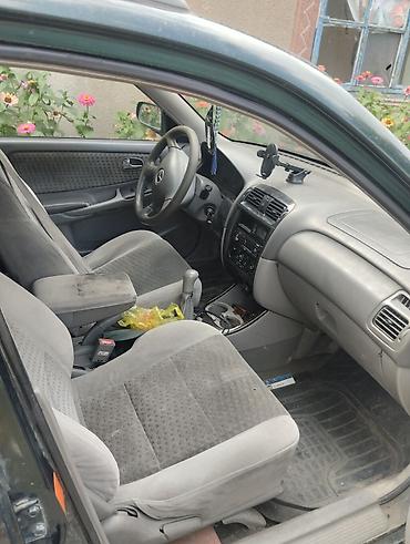 стёк: Mazda 626: 2000 г., 2 л, Механика, Бензин, Универсал — 2