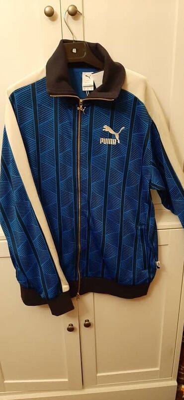 спортивные костюмы пума: Стильная олимпийка Puma в синих тонах с геометрическим узором. Модель