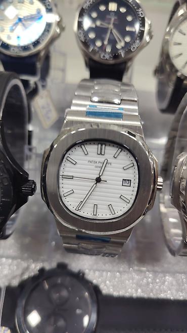 bakida saat: Patek Philippe Nautilus üslubunda kişi saatları – polad korpus və — 5