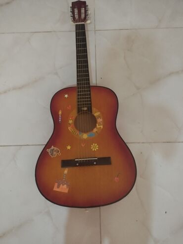 Aro: Gitara, 50 man. Unvan Masazir