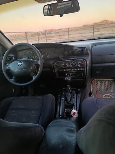 Opel: Opel Omega: 2 l | 1999 il Sedan — 9