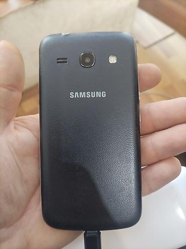 telefon tutacagı: Samsung GT-S7220, rəng - Qara, İki sim kartlı — 2