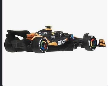 Автоунаалардын моделдери: Коллекционная модель болида Формулы‑1 McLaren (раскраска с логотипами — 2