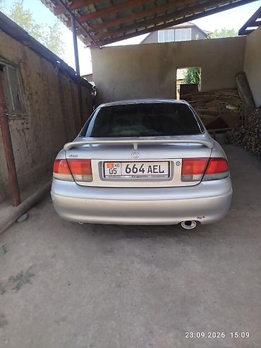 Mazda 626: 1995 г., 1.8 л, Механика, Бензин, Седан