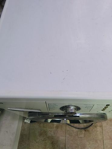 Paltaryuyan maşınlar: SALAM LG 7 KG ÇATDİRİLMA PULSUZ LG paltaryuyan maşın – ön yükləməli — 5