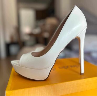 solomon cipele: Pumps