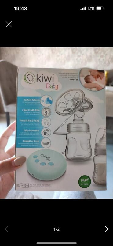Yeni südsagan kiwi elektrik süd sağan apparat. yenidir, istifadə