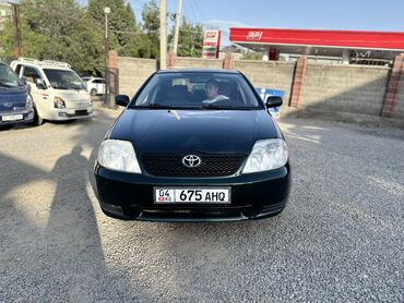 купить диск сцепления: Темно-зеленый седан Toyota Corolla с четырехдверным кузовом, идеально