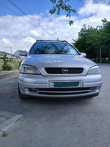 opel astra xectbek: Opel Astra Caravan (Universal) – gümüşü rəng Xüsusiyyətlər: - Kuzov — 1