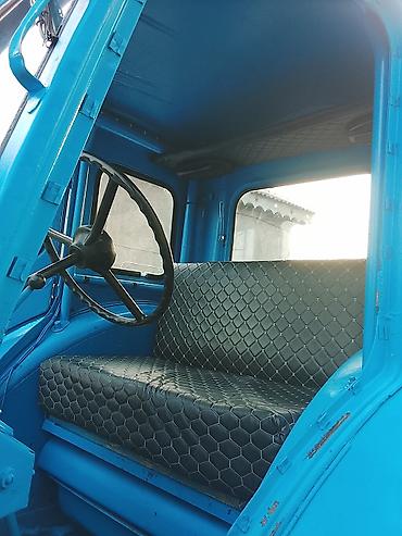 tractor belarus 1221: Mavi rəngli təkərli kənd təsərrüfatı traktoru. Xüsusiyyətlər: - Ön və — 4