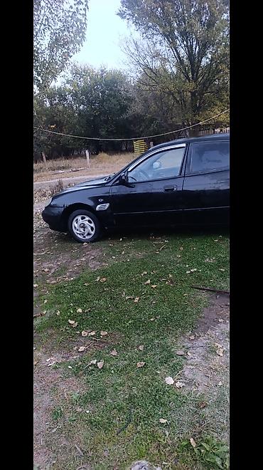 митсубиси спайк стар: Daewoo Leganza: 1998 г., 1.8 л, Механика, Бензин, Седан — 6