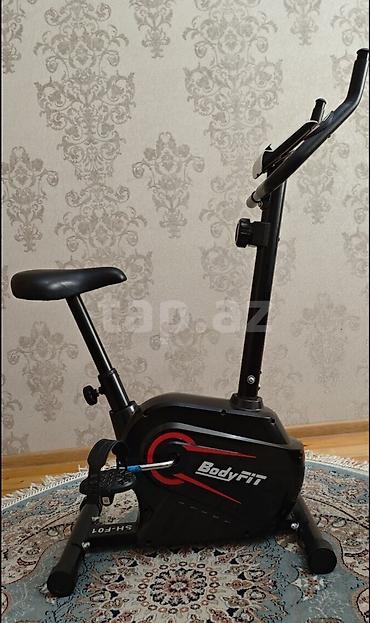 mosped az: BodyFit stasionar velotrenajor - Kompakt şaquli tip dizayn, evdə məşq — 1