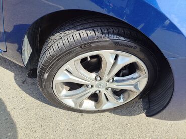 Hyundai: Hyundai Elantra GT, mavi rəng, hetçbek kuzov. - Güclü və qənaətcil — 18