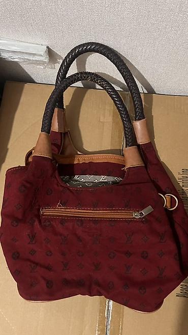 louis: Сумка Louis Vuitton(скорее всего реплика)бордовая,дырка внутри, чуть — 2