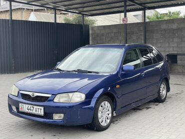 бак 210: Mazda 323: 2000 г., 1.6 л, Механика, Бензин, Хэтчбэк