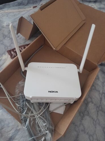 Monitorlar: Nokia G-1425G-B Wi‑Fi router/ONT Xüsusiyyətlər: - 2 ədəd xarici