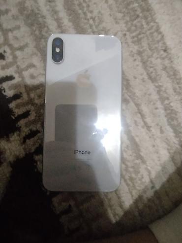 Мобильные телефоны: IPhone X - Корпус: стекло/сталь, цвет серебристый - Экран: OLED Super — 2