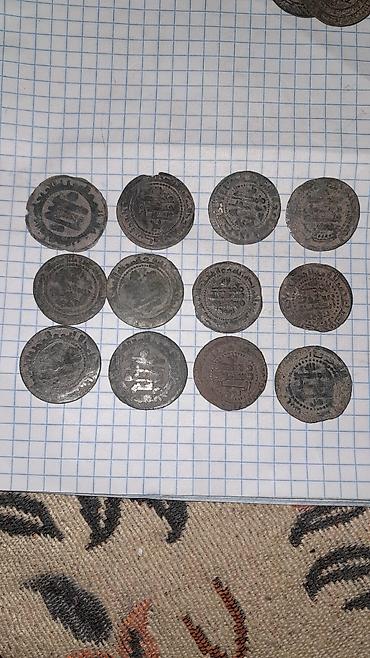 Монеты: Старинная монета с арабской легендой Описание: - Круглая — 23