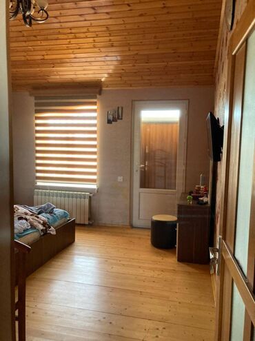 Bağ evlərinin satışı: Novxanıda əsas yoldan təxminən 200 metr məsafədə 12 sot torpaq — 26