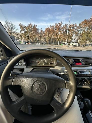 не спеша: Mitsubishi Lancer: 2004 г., 2 л, Автомат, Бензин, Седан — 5