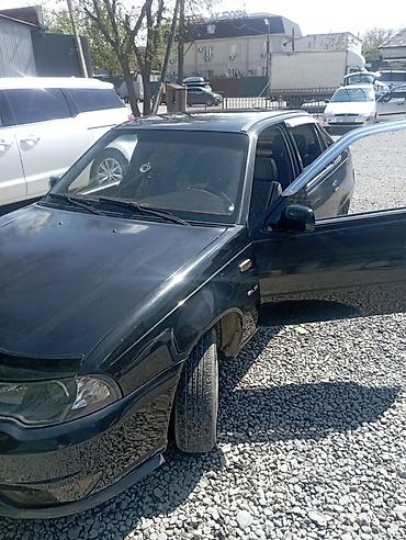 baic eu5: Седан черного цвета с бензиновым двигателем и передним приводом. Кузов — 2