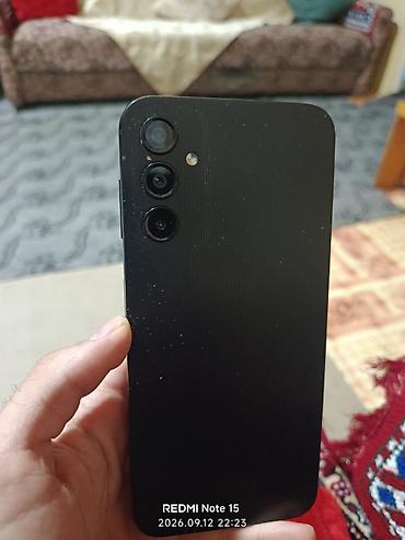 200 manata telefonlar: Samsung Galaxy A14, 64 GB, rəng - Boz, Barmaq izi, Face ID — 3