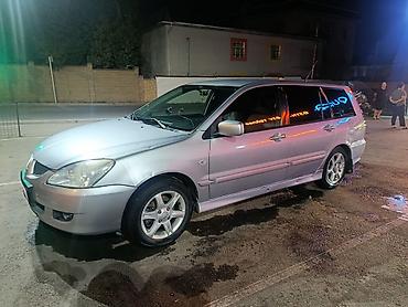 руль мицубиси: Mitsubishi Lancer: 2005 г., 1.6 л, Механика, Бензин, Универсал — 3