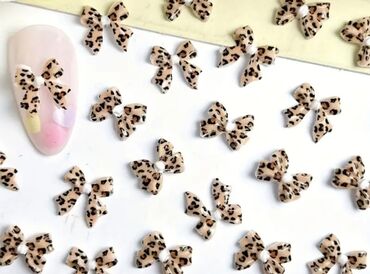 Nega noktiju: Set minijaturnih ukrasnih privesaka za nokte u obliku mašnica — 6