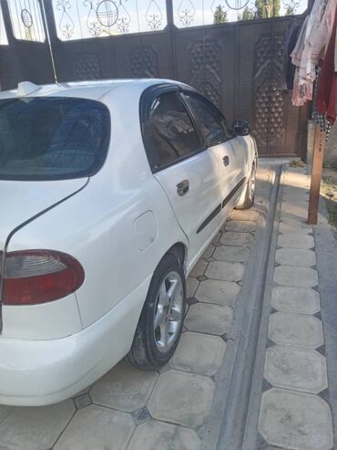 камаз 2001: Daewoo Lanos: 1997 г., 1.6 л, Механика, Бензин, Седан