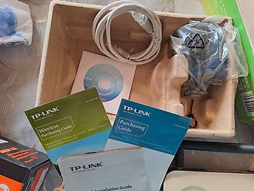 printer 3 u birində: TP-Link brendinə məxsus 54Mbps sürətə malik, simsiz G router. Bu cihaz — 2