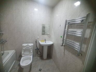 Uzunmüddətli kirayə mənzillər: Yasamal Midada Yeni tikilmiş 9 mərtəbəli binanın 1-ci mərtəbəsində 2 — 9