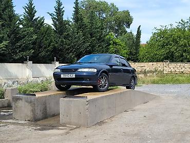 Opel: Opel Vectra B sedan - Kuzov: 4 qapılı sedan, tünd göy rəng - Mühərrik — 8