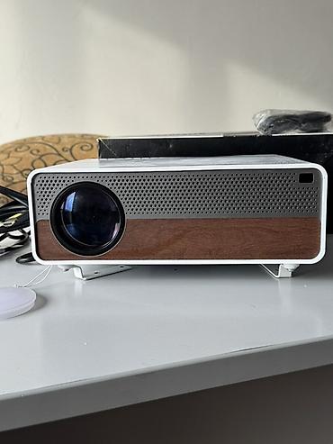 Проекторы: Проектор для домашнего кинотеатра - Компактный LED‑проектор «Home — 1