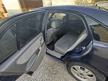 385 55: Mazda 626: 2000 г., 1.8 л, Механика, Бензин, Хэтчбэк — 5