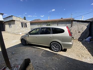 вязанную накидку: Honda Stream: 2003 г., 1.7 л, Автомат, Бензин, Универсал — 4
