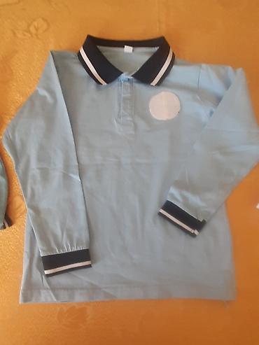 Digər qadın geyimləri: Bir neçə müxtəlif dizaynlı qadın köynəkləri təqdim olunur. Birincisi — 7