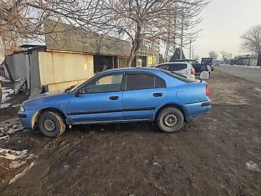 mitsubishi lancer evolution: Mitsubishi Carisma: 2001 г., Седан — 2
