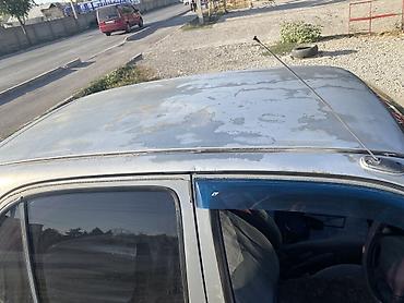 бартавой сапог: Nissan March: 2000 г., 1.3 л, Автомат, Бензин, Универсал — 9